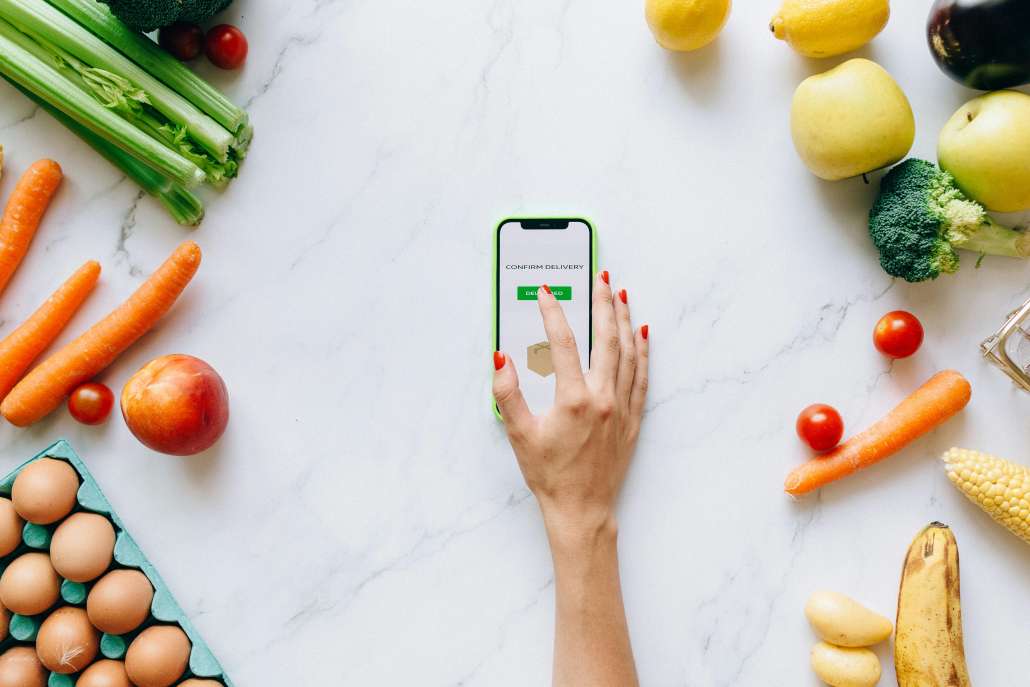 A person uses a virtual grocery shopping app